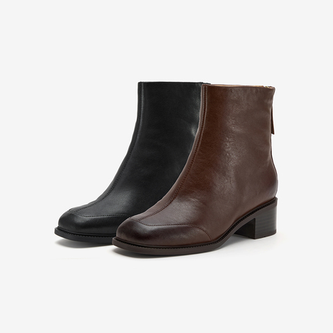 Bata时装靴女2025冬季新款羊皮弹力软底通勤粗跟短筒靴ATO49DD5