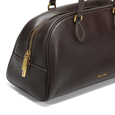 百丽包包女25冬新商场同款简约复古通勤大号单肩波士顿包BL862DX5