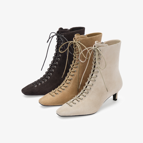 73hours女鞋混搭美学2025冬季新品尖头细跟系带时装靴