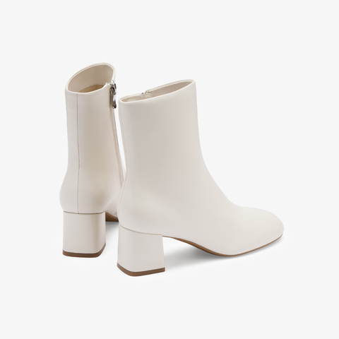 73hours女鞋回归极简2025冬季新品圆头方跟纯色时装靴