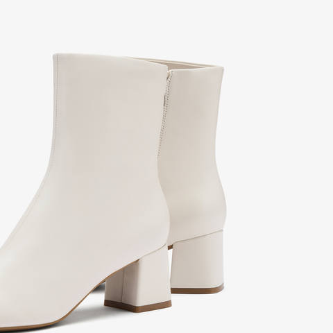 73hours女鞋回归极简2025冬季新品圆头方跟纯色时装靴