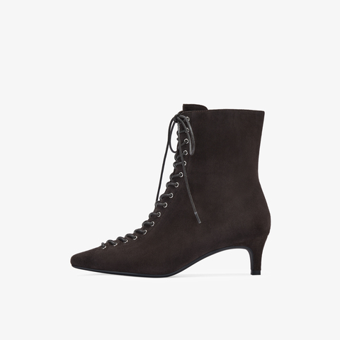 73hours女鞋混搭美学2025冬季新品尖头细跟系带时装靴