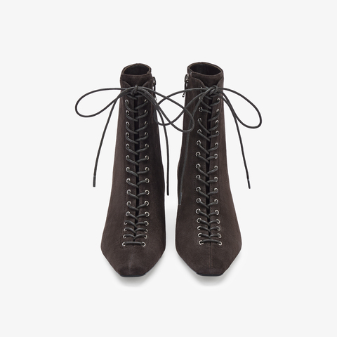 73hours女鞋混搭美学2025冬季新品尖头细跟系带时装靴