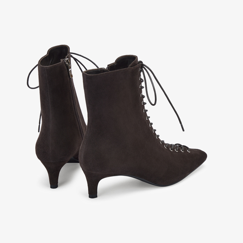 73hours女鞋混搭美学2025冬季新品尖头细跟系带时装靴