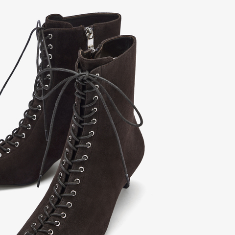 73hours女鞋混搭美学2025冬季新品尖头细跟系带时装靴