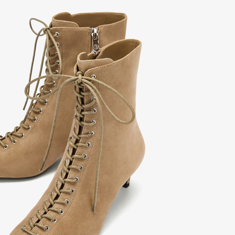 73hours女鞋混搭美学2025冬季新品尖头细跟系带时装靴