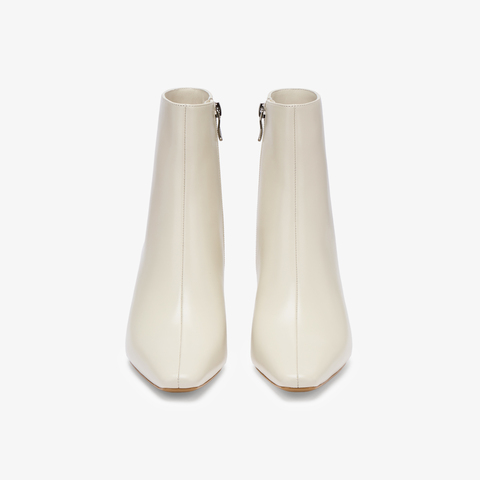 73hours女鞋都市剪影2025冬季新品坡跟尖头纯色时装靴