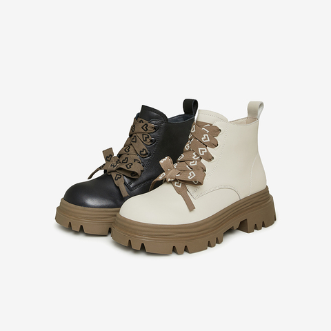 Tata/他她2023冬商场同款时尚休闲撞色甜美风女靴WE901DD3